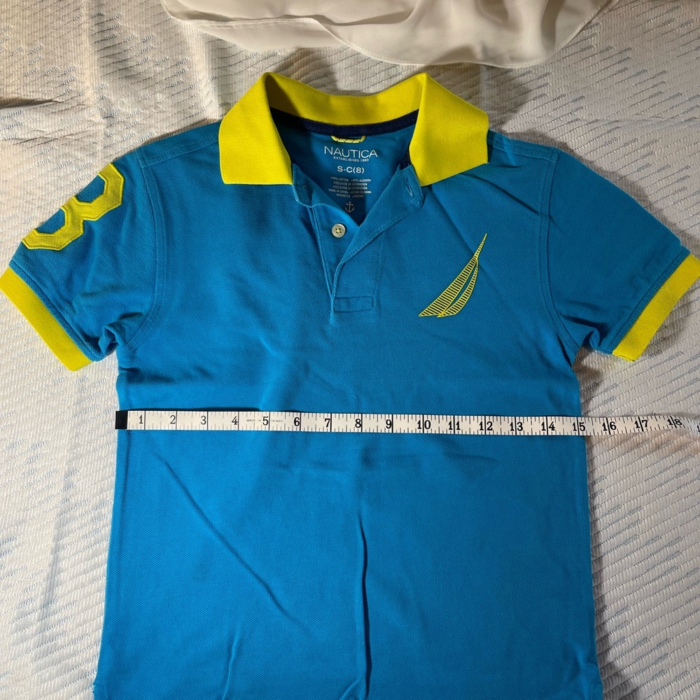 Nautica Boys size 8 polo shirt in bright blue and yellow. Barely worn.
